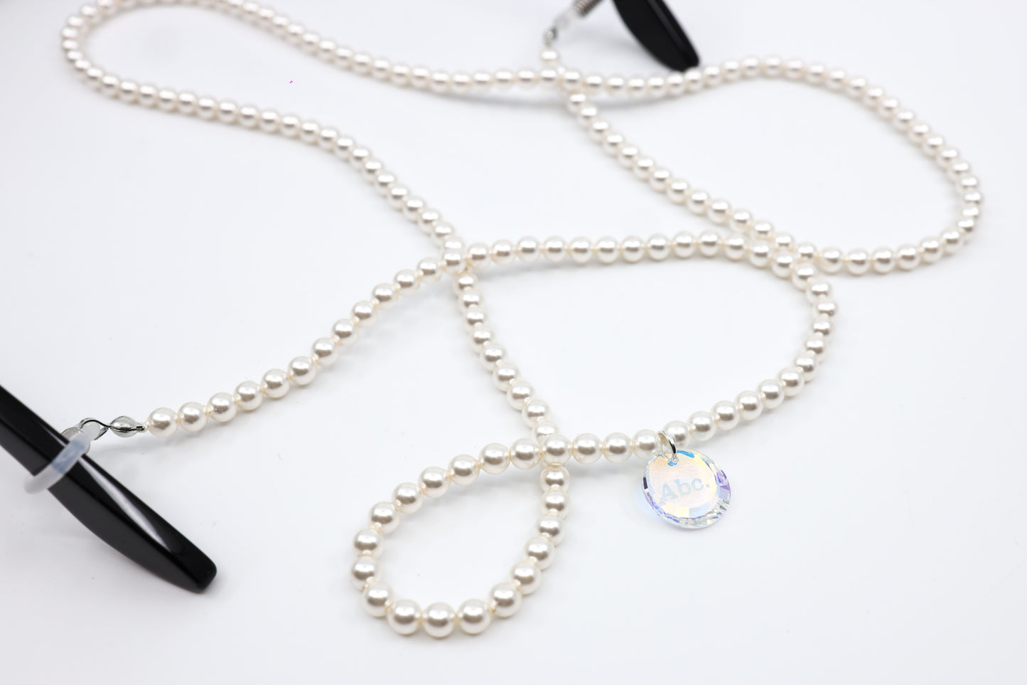 ADVISORY BOARD CRYSTALS (ABC) BLACK FRAMES WITH PEARL EYEGLASS CHAIN