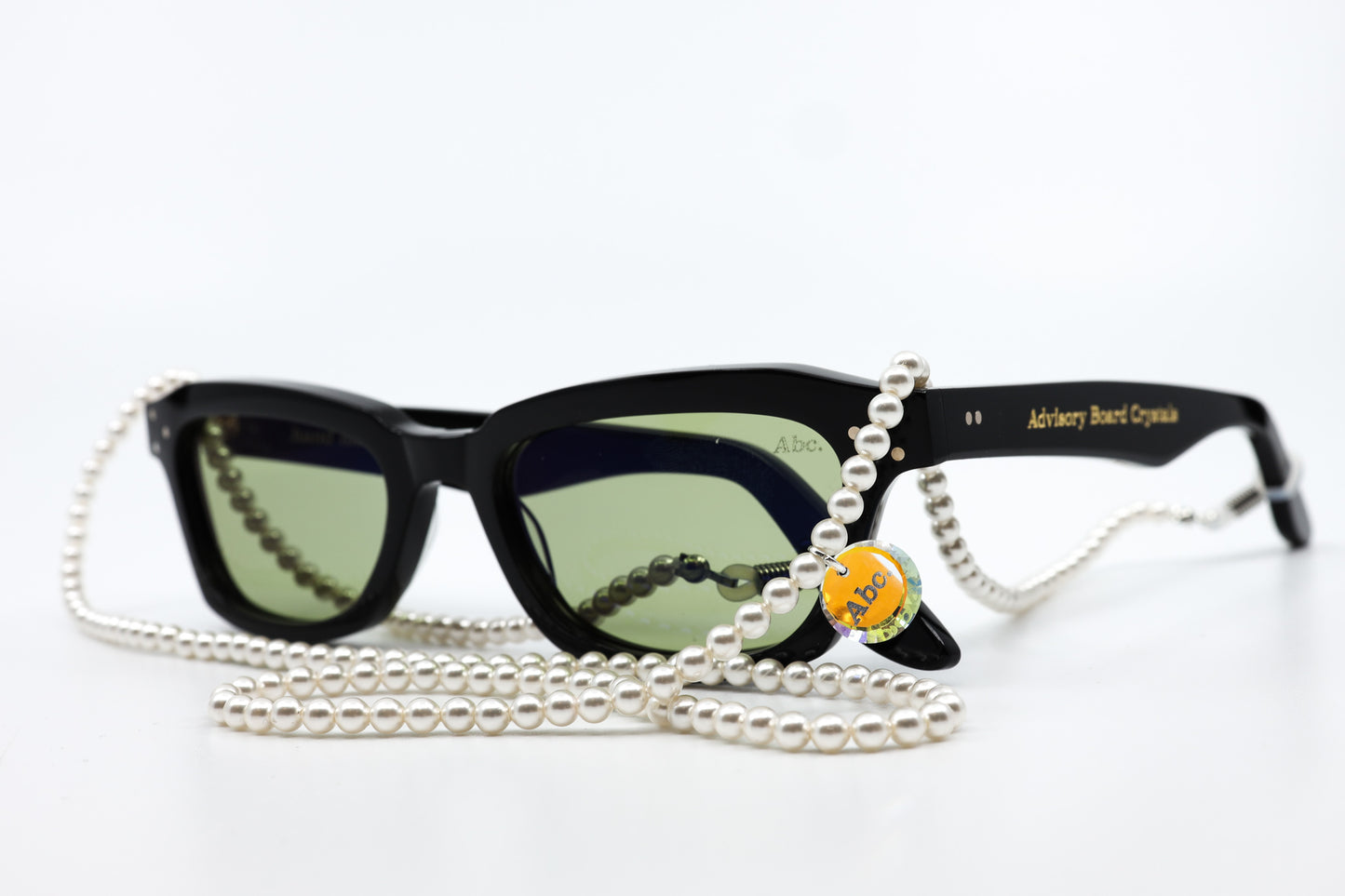 ADVISORY BOARD CRYSTALS (ABC) BLACK FRAMES WITH PEARL EYEGLASS CHAIN